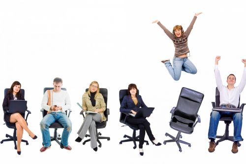 people in office chairs